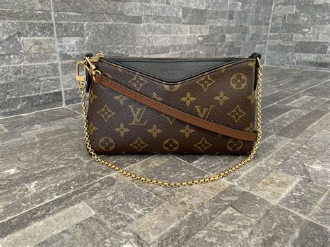 louis vuitton clutch second hand